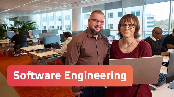 Eneco colleagues working behind laptops